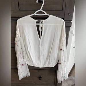 Chic White Blouse with Embroidered Sleeves